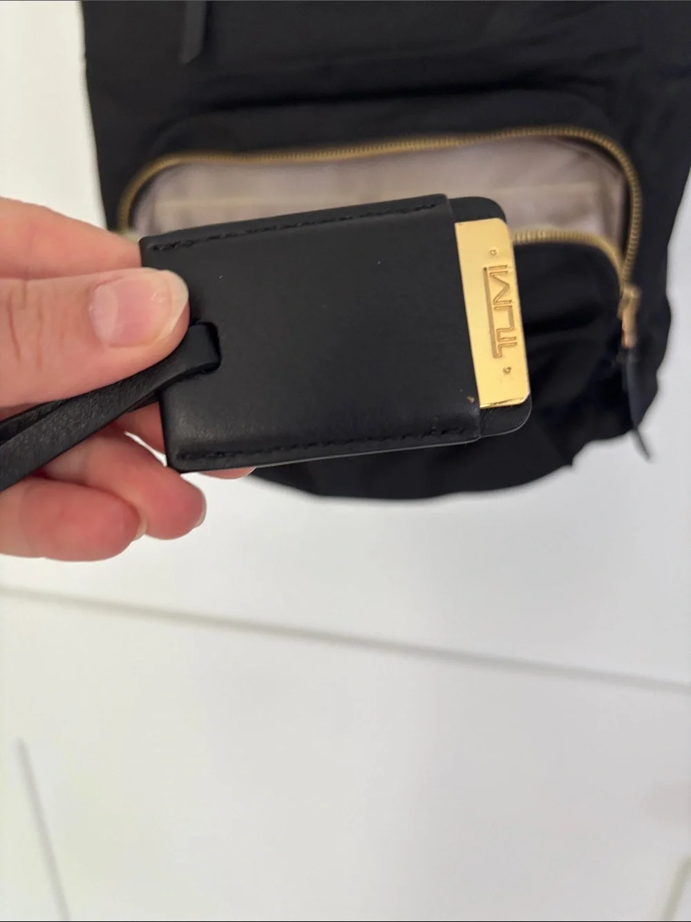 Tumi Voyaguer Halle Black Nylon Backpack with Gold Hardware Accents